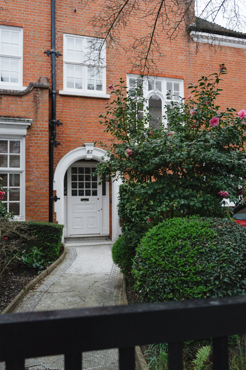 London brick home with a garden entrance